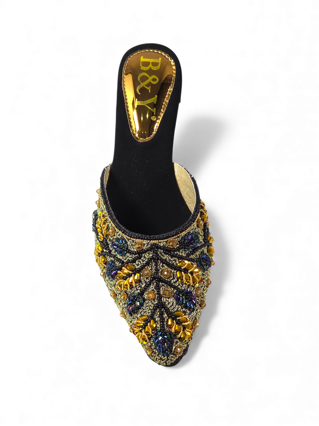 A black and gold embellished shoe with a gold heel and floral pattern.