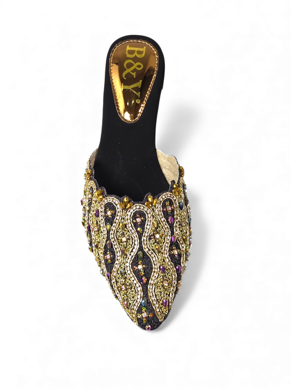 A black and gold embellished shoe with a gold heel and toe.