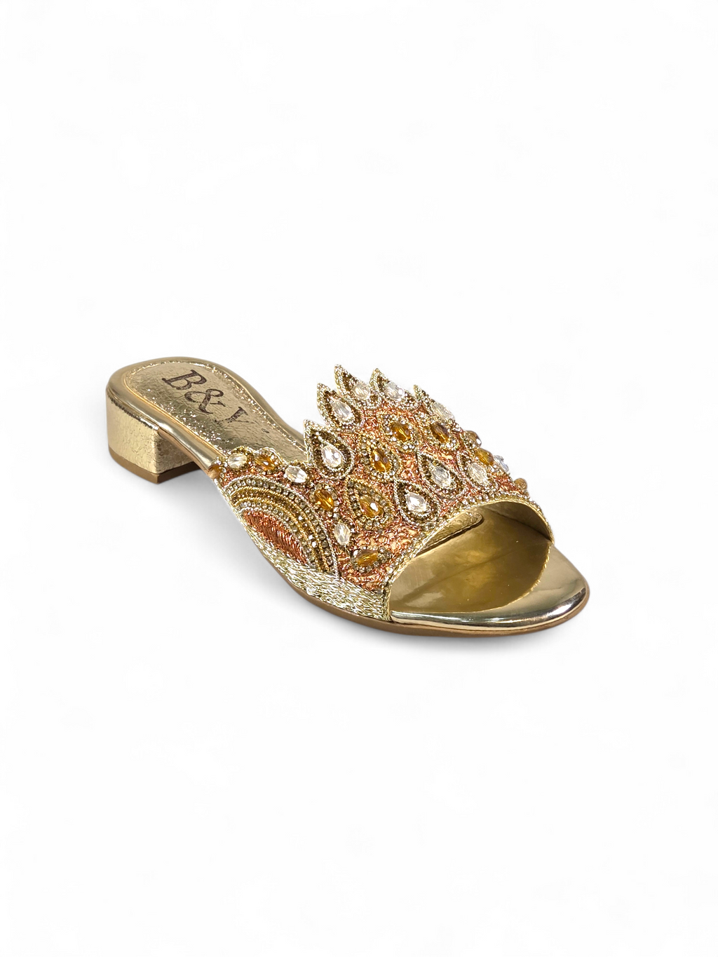 A gold and beige embellished sandal with a decorative pattern and rhinestones or crystals on the toe and heel.