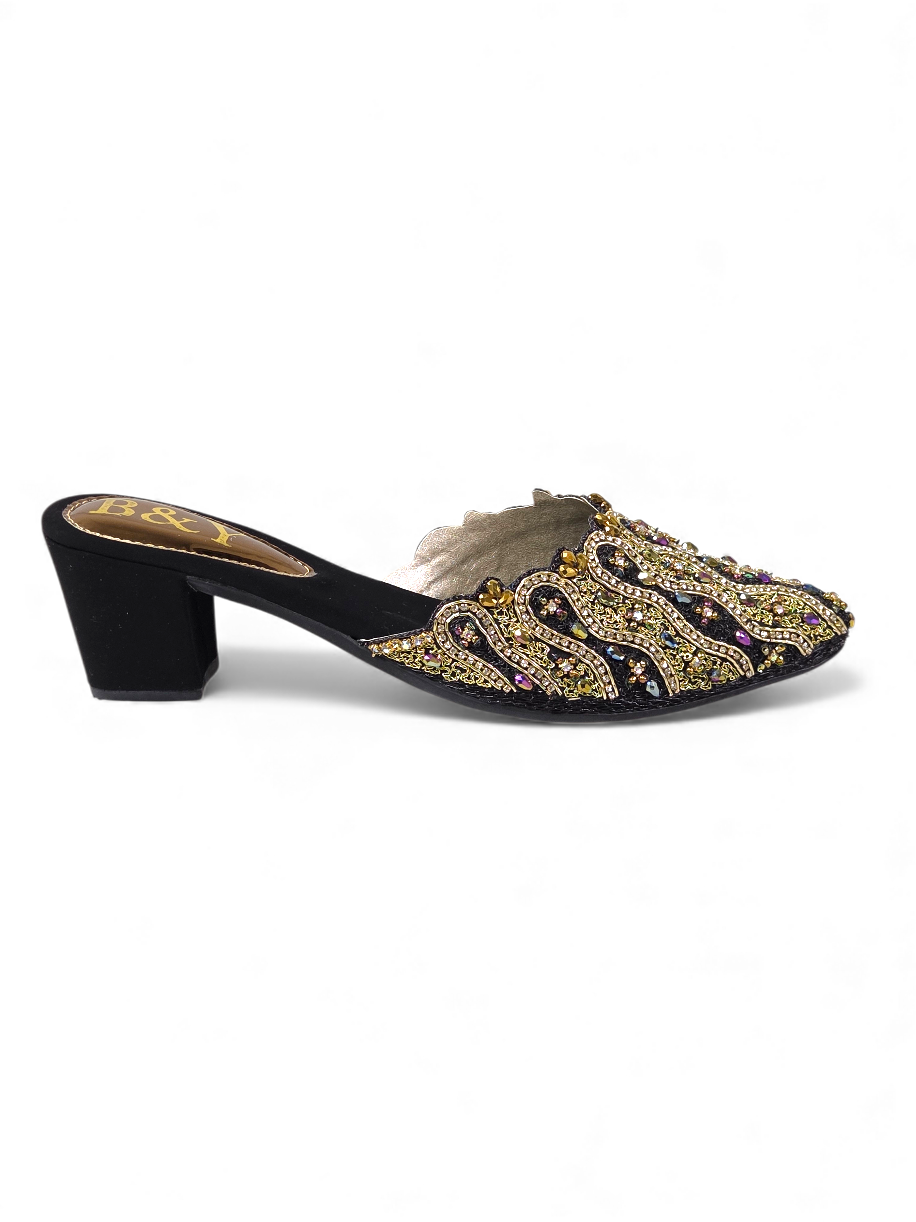 A black and gold embellished mule-style shoe with a pointed toe and a chunky heel.